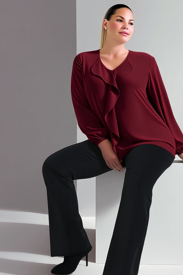 Koyu mavi volan detaylı büyük beden abiye bluz, HANEZZA markasıyla şık tasarım ve rahat kesim sunuyor.