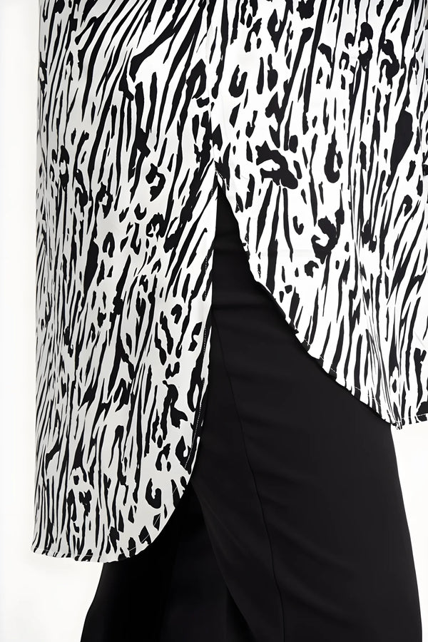 Büyük beden kadınlar için şık, siyah beyaz çizgili uzun gömlek.