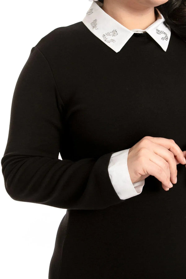 لمسة خاصة لمناسباتك الخاصة: فستان بياقة شبكية فولاذية